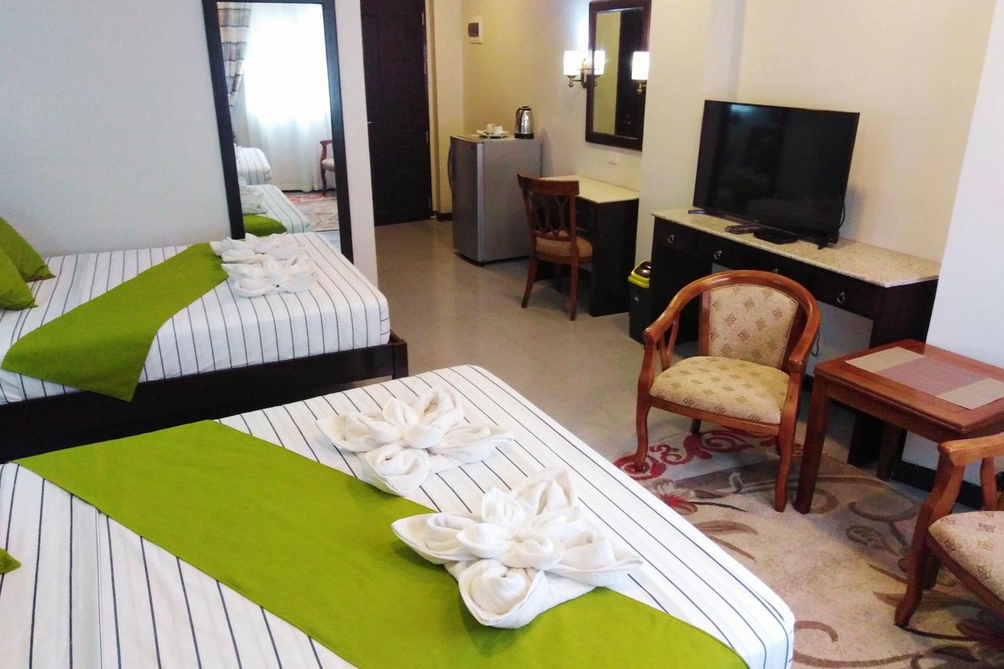 Venezia Suites Hotel Iloilo Szoba fotó