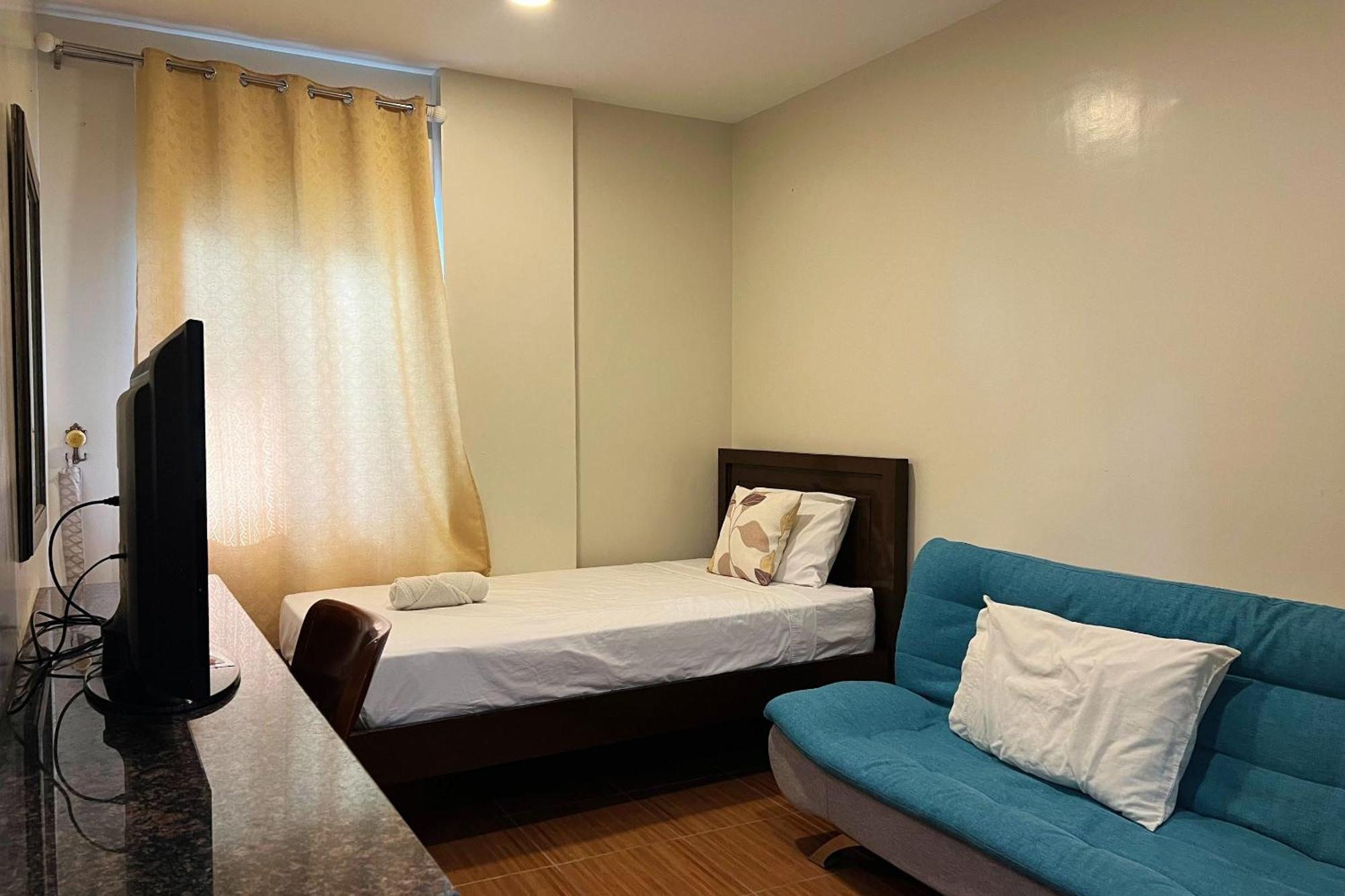 Venezia Suites Hotel Iloilo Szoba fotó